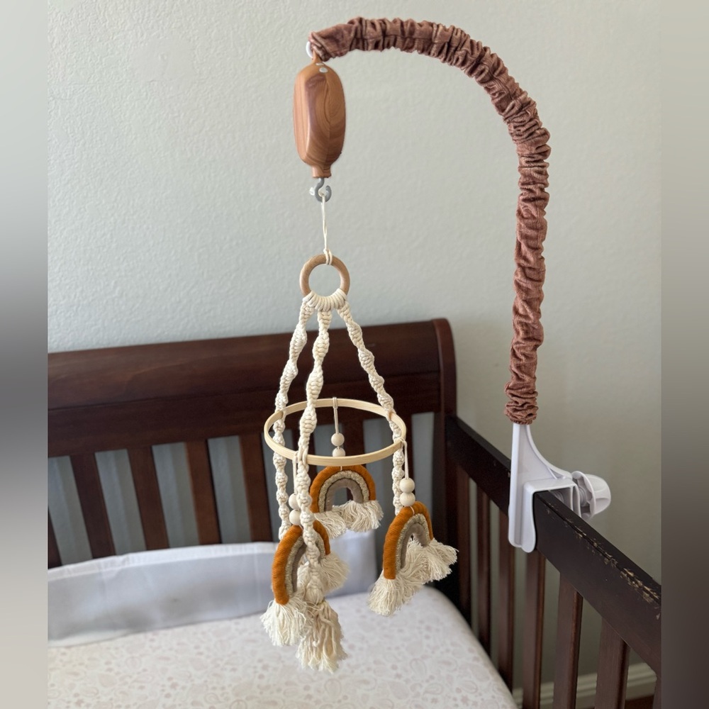 Baby rainbow mobile with singing box and hook.